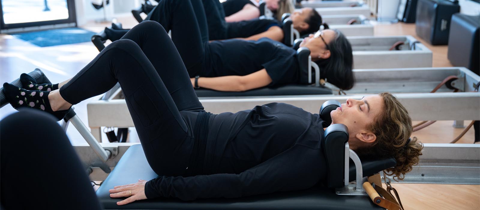 Pilates group reformer class at Scarsdale Pilates